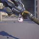A kitten charm hangs off a weapon.